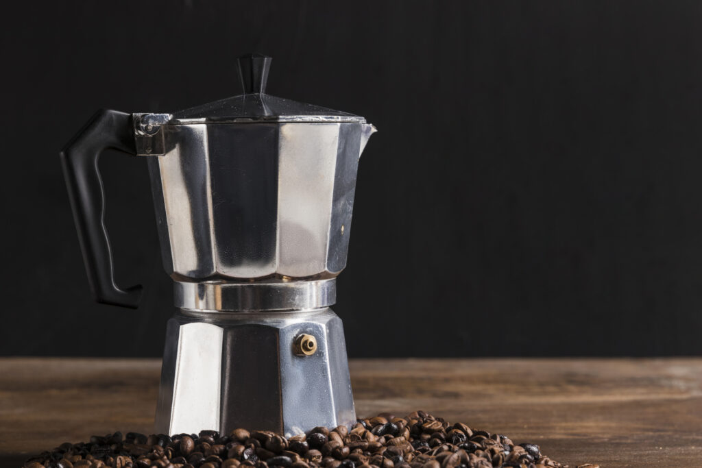 geyser coffee maker near grains